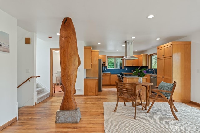 6373 Eastwood Rd, Deming, WA 98244 - dining space featuring light wood-type flooring, stairs, and recessed lighting