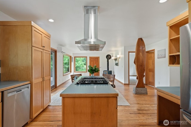 6373 Eastwood Rd, Deming, WA 98244 - kitchen featuring stainless steel appliances, range hood, a center island, light wood-style flooring, and recessed lighting