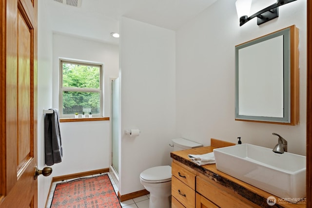 6373 Eastwood Rd, Deming, WA 98244 - full bathroom featuring vanity, a shower with shower door, and tile patterned flooring