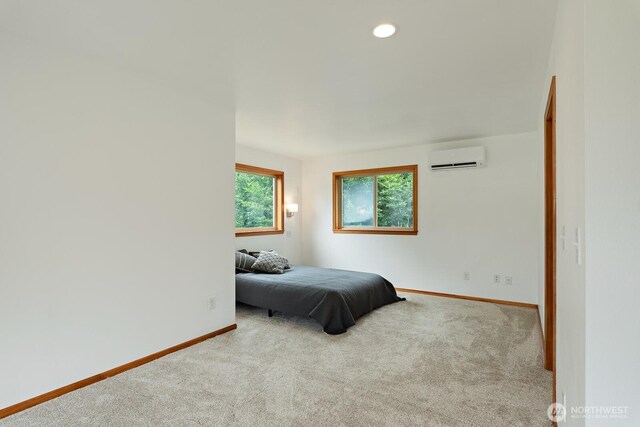 6373 Eastwood Rd, Deming, WA 98244 - bedroom with an AC wall unit, carpet flooring, and recessed lighting