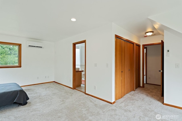 6373 Eastwood Rd, Deming, WA 98244 - unfurnished bedroom with a wall unit AC, light carpet, and a closet