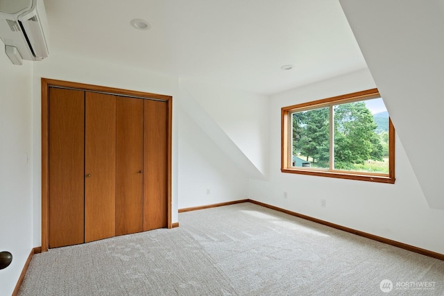 6373 Eastwood Rd, Deming, WA 98244 - unfurnished bedroom with a wall mounted AC, carpet floors, and a closet