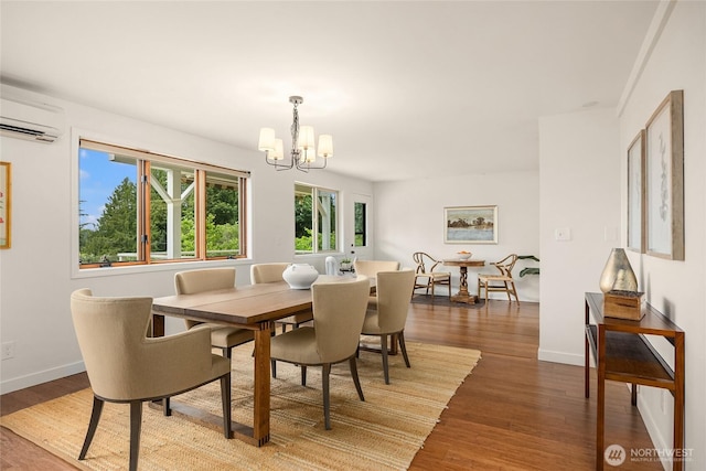 11665 NE Sunset Loop, Bainbridge Island, WA 98110 - dining room featuring a chandelier, wood finished floors, and a wall mounted AC