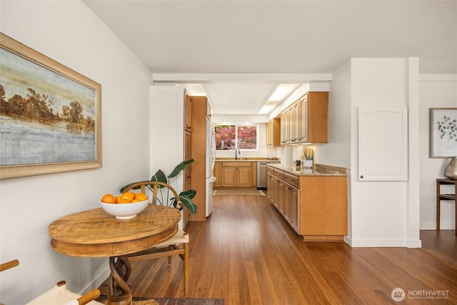 11665 NE Sunset Loop, Bainbridge Island, WA 98110 - kitchen with stainless steel dishwasher, dark wood-type flooring, brown cabinetry, and light countertops