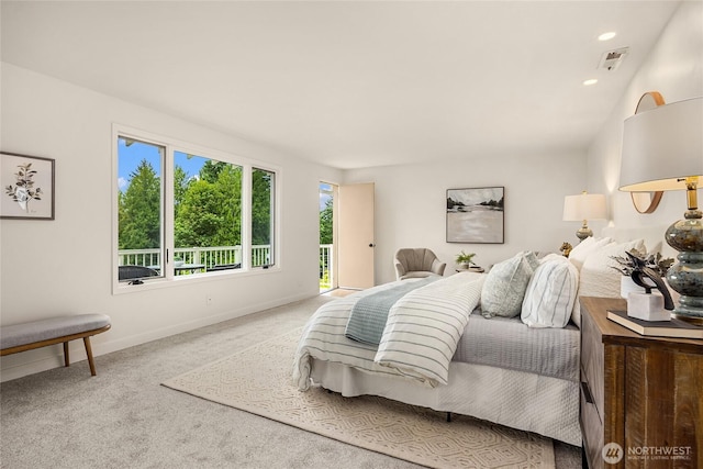 11665 NE Sunset Loop, Bainbridge Island, WA 98110 - carpeted bedroom with access to outside and recessed lighting