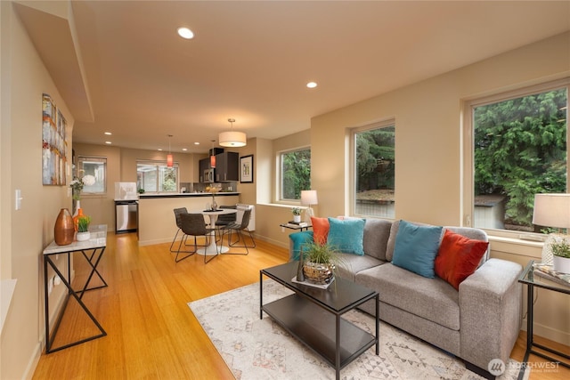 3926A S Brandon St, Seattle, WA 98118 - living area featuring light wood-style flooring and recessed lighting