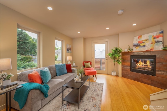 3926A S Brandon St, Seattle, WA 98118 - living room featuring a fireplace, wood finished floors, and recessed lighting