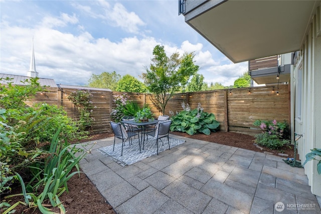 3926A S Brandon St, Seattle, WA 98118 - fenced backyard featuring a patio area and outdoor dining space