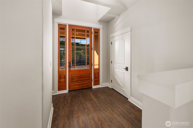 3224 Overlook Loop, Ilwaco, WA 98624 - entrance foyer with dark wood-style flooring and baseboards