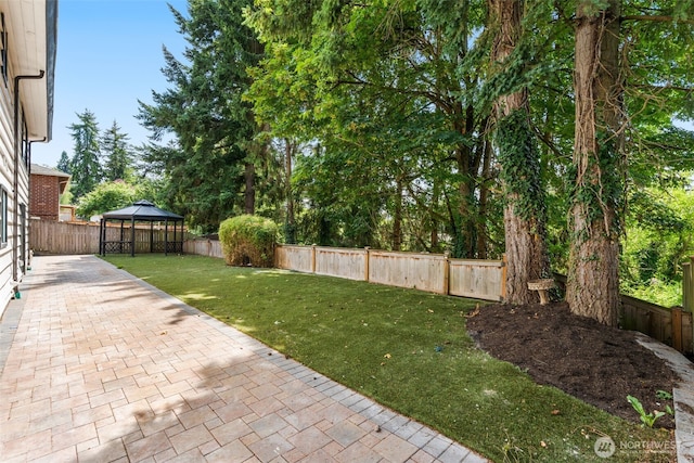 21239 15th Ave S, Des Moines, WA 98198 - fenced backyard with a gazebo and a patio