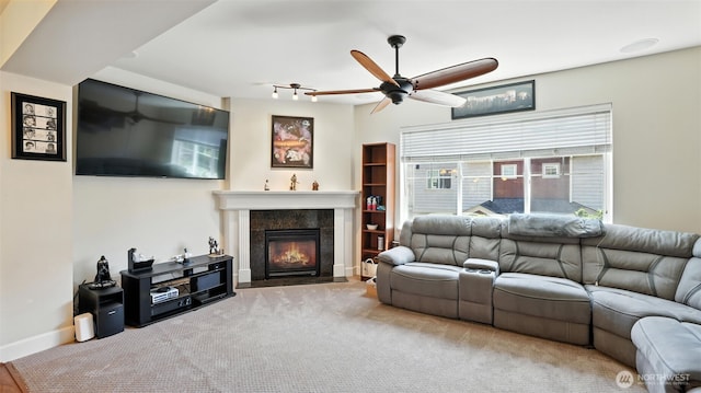 4650 NE 3rd Ln Unit F1, Renton, WA 98059 - living area with ceiling fan, a tile fireplace, and carpet