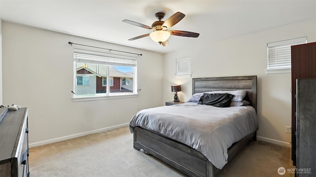 4650 NE 3rd Ln Unit F1, Renton, WA 98059 - bedroom with carpet flooring and a ceiling fan