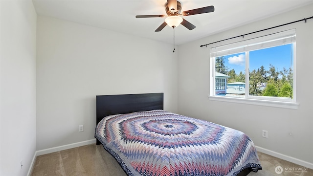 4650 NE 3rd Ln Unit F1, Renton, WA 98059 - bedroom featuring carpet and a ceiling fan