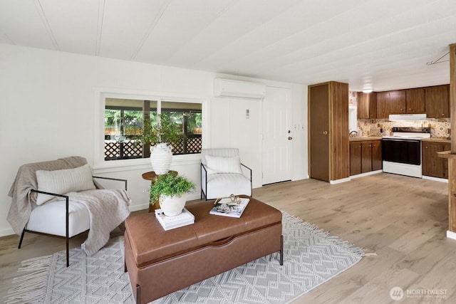 6219 Shamrock Rd, Maple Falls, WA 98266 - living room featuring light wood-style floors and a wall mounted AC
