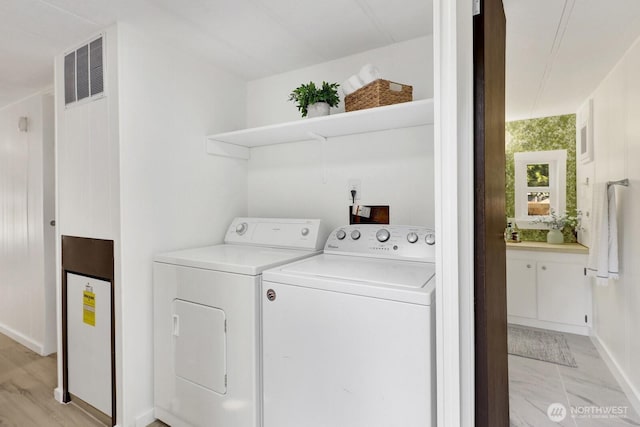6219 Shamrock Rd, Maple Falls, WA 98266 - washroom featuring washing machine and clothes dryer and baseboards