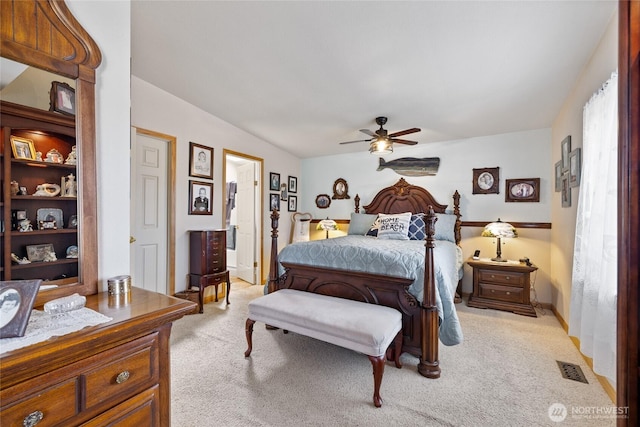 836 Harman Way S Unit 82, Orting, WA 98360 - bedroom featuring light carpet, a ceiling fan, and ensuite bath