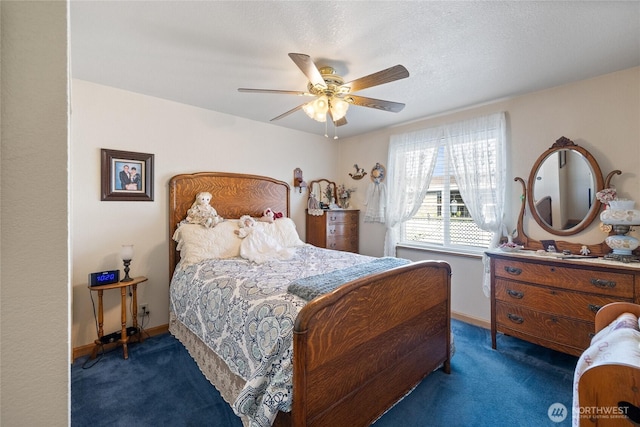 836 Harman Way S Unit 82, Orting, WA 98360 - carpeted bedroom with ceiling fan and baseboards