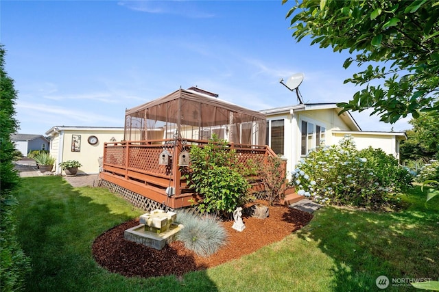 836 Harman Way S Unit 82, Orting, WA 98360 - back of house featuring a gazebo, a wooden deck, and a yard