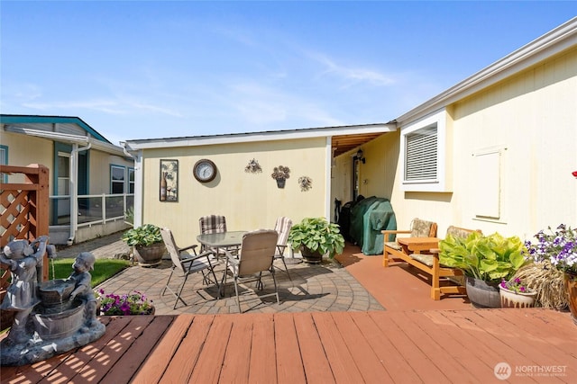 836 Harman Way S Unit 82, Orting, WA 98360 - wooden deck with outdoor dining space