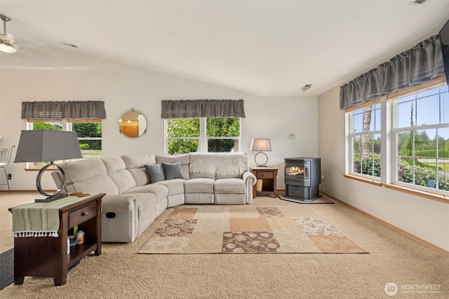 16116 4th Ave NW, Arlington, WA 98223 - carpeted living area with a wood stove, healthy amount of natural light, vaulted ceiling, and ceiling fan