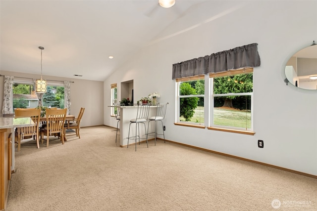 16116 4th Ave NW, Arlington, WA 98223 - dining room with lofted ceiling, light carpet, and a ceiling fan