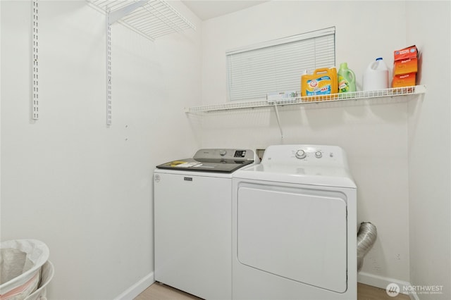 17426 Bothell Way NE Unit A105, Bothell, WA 98011 - laundry room with washer and dryer and wood finished floors