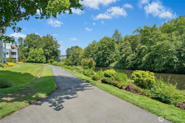 17426 Bothell Way NE Unit A105, Bothell, WA 98011 - view of property's community featuring a water view and a yard
