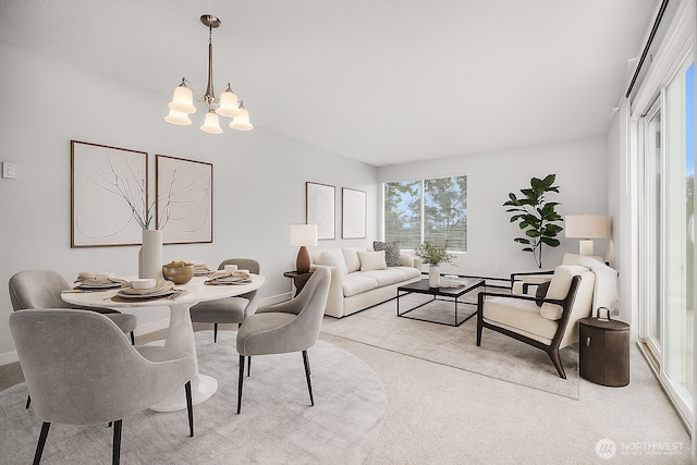 17431 Ambaum Blvd S Unit C24, Burien, WA 98148 - dining space featuring a chandelier and light colored carpet