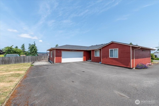 1890 Edgewood Dr, Camano Island, WA 98282 - ranch-style home with a garage and asphalt driveway