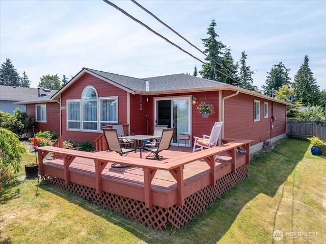 1890 Edgewood Dr, Camano Island, WA 98282 - rear view of house featuring a wooden deck and outdoor dining space