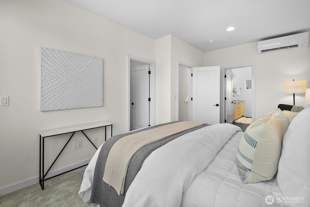 501 11th Ave E, Seattle, WA 98102 - bedroom with a wall unit AC, light carpet, recessed lighting, and connected bathroom
