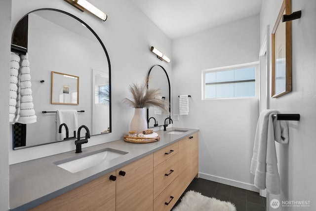 501 11th Ave E, Seattle, WA 98102 - bathroom with double vanity and tile patterned flooring