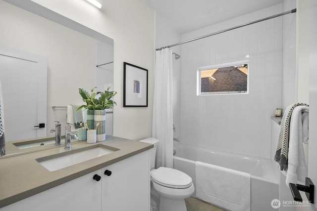 501 11th Ave E, Seattle, WA 98102 - bathroom featuring vanity and shower / bath combo with shower curtain