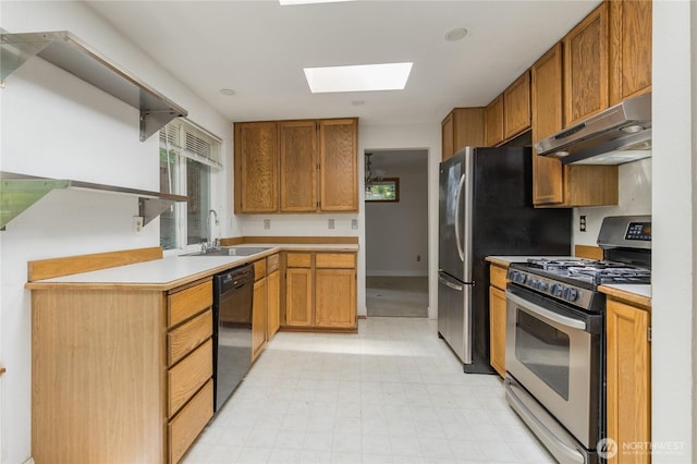 20713 NE 44th St, Sammamish, WA 98074 - kitchen with appliances with stainless steel finishes, under cabinet range hood, a skylight, open shelves, and light floors