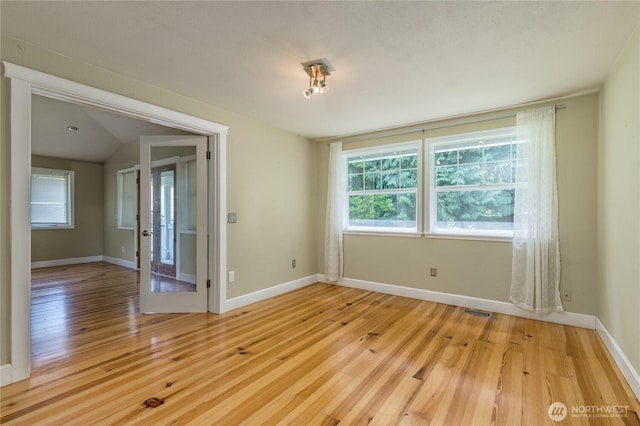 20713 NE 44th St, Sammamish, WA 98074 - empty room featuring light wood finished floors and healthy amount of natural light