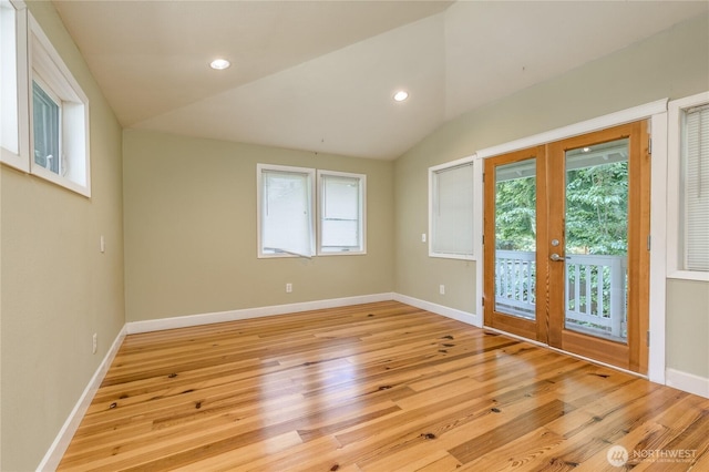 20713 NE 44th St, Sammamish, WA 98074 - empty room featuring french doors, light wood-style floors, lofted ceiling, and recessed lighting