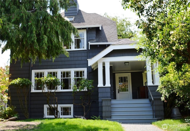 1809 NE 63rd St, Seattle, WA 98115 - view of front facade with a shingled roof and a porch