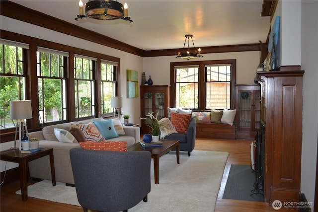 1809 NE 63rd St, Seattle, WA 98115 - living area featuring healthy amount of natural light, light wood-type flooring, and a chandelier