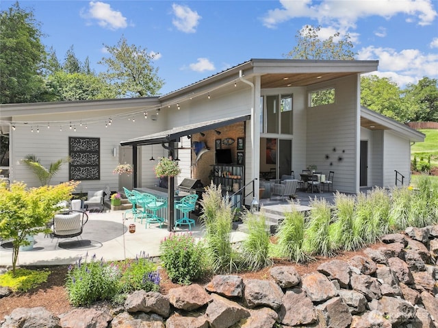 30005 NE 12th Ct, Ridgefield, WA 98642 - rear view of property featuring a patio area