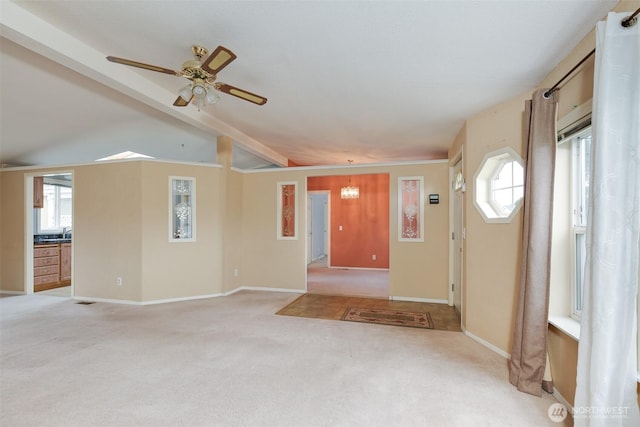 2610 E Section St Unit 85, Mount Vernon, WA 98274 - unfurnished living room with light carpet, plenty of natural light, a ceiling fan, and a chandelier