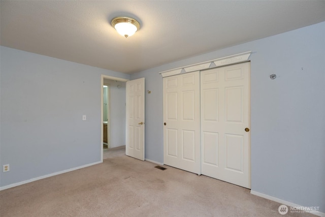 2610 E Section St Unit 85, Mount Vernon, WA 98274 - unfurnished bedroom featuring carpet and a closet