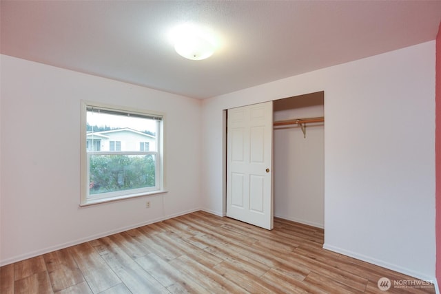 2610 E Section St Unit 85, Mount Vernon, WA 98274 - unfurnished bedroom featuring light wood finished floors and a closet