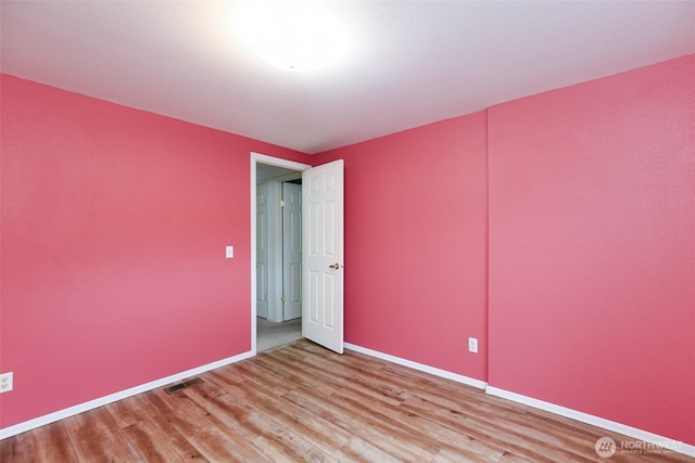 2610 E Section St Unit 85, Mount Vernon, WA 98274 - unfurnished room with wood finished floors and baseboards