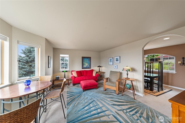 4607 Camano Pl, Anacortes, WA 98221 - living area featuring arched walkways, carpet floors, healthy amount of natural light, and recessed lighting