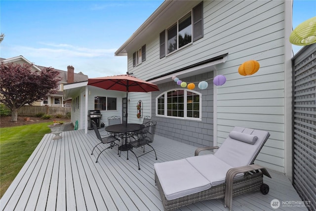 4607 Camano Pl, Anacortes, WA 98221 - wooden deck with grilling area and outdoor dining area