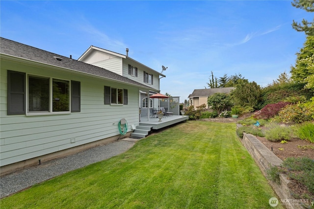 4607 Camano Pl, Anacortes, WA 98221 - view of grassy yard with a deck