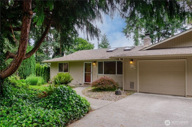 5211 53rd St W, University Place, WA 98467 - single story home featuring an attached garage, a chimney, concrete driveway, and a shingled roof