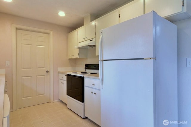 5211 53rd St W, University Place, WA 98467 - kitchen with white appliances, under cabinet range hood, light countertops, white cabinets, and recessed lighting