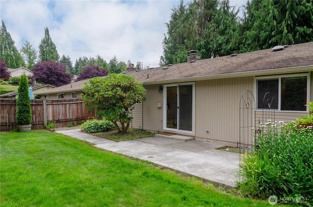 5211 53rd St W, University Place, WA 98467 - back of property featuring a patio area and a chimney