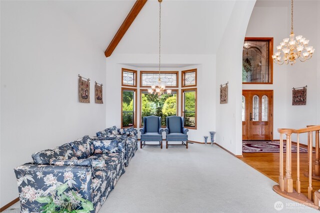 1408 W St NW, Auburn, WA 98001 - living room with a chandelier, high vaulted ceiling, beamed ceiling, and carpet